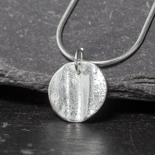 Ribbon Disc Silver Pendant by Silverfish
