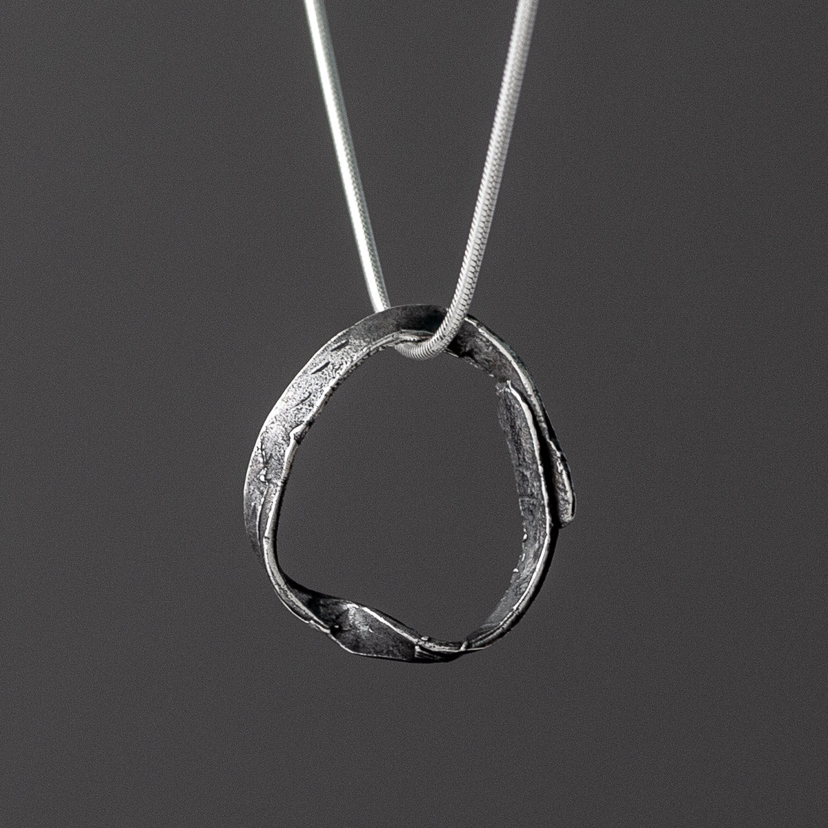 Embrace Oxidised Silver Pendant - Looped by Silverfish