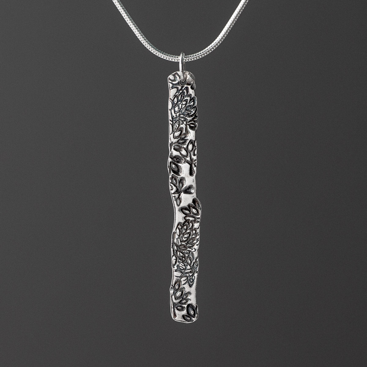 Flora Stem Oxidised Silver Pendant by Silverfish