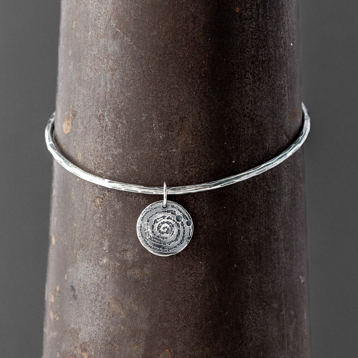 Llanbedr Spiral Oxidised Silver Bangle by Silverfish