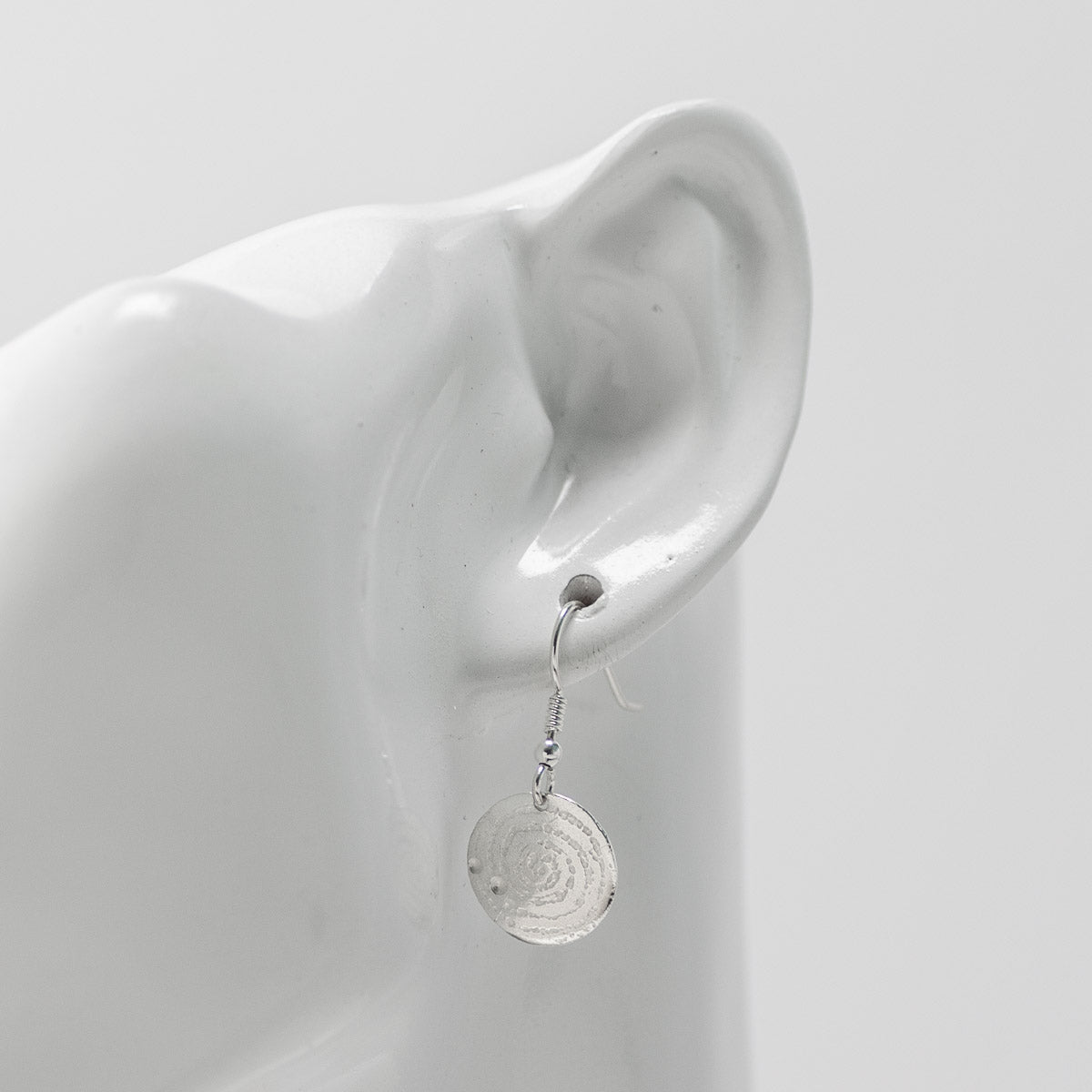 Llanbedr Spiral Silver Drop Earrings by Silverfish