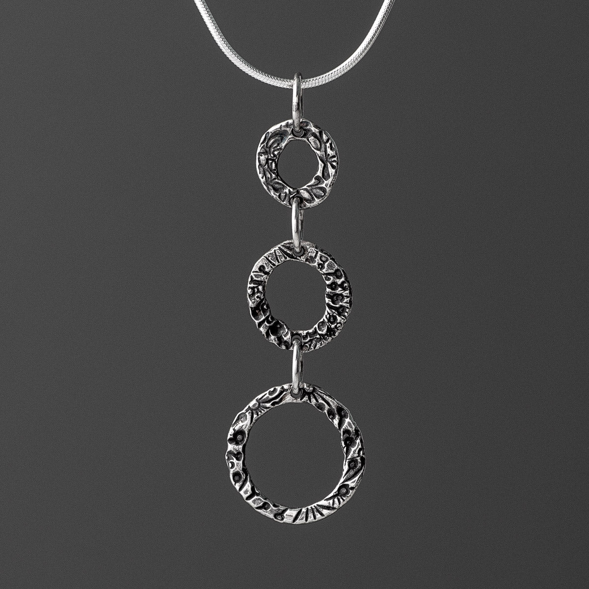 Flora Circle Pendant - Triple - Small - Oxidised Silver by Silverfish