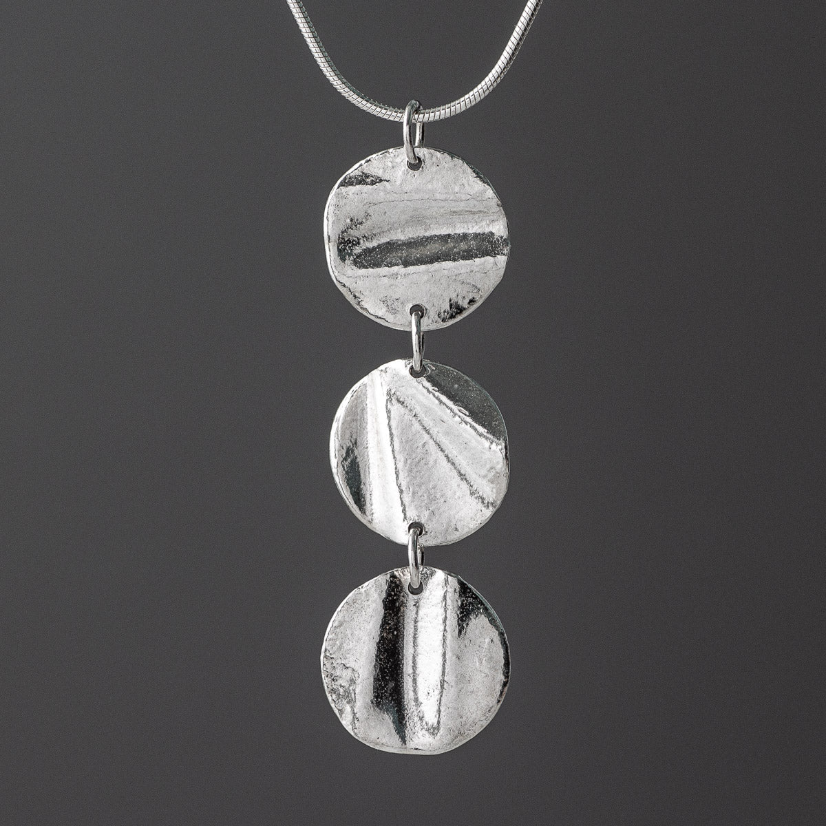 Ribbon Disc Triple Silver Pendant by Silverfish