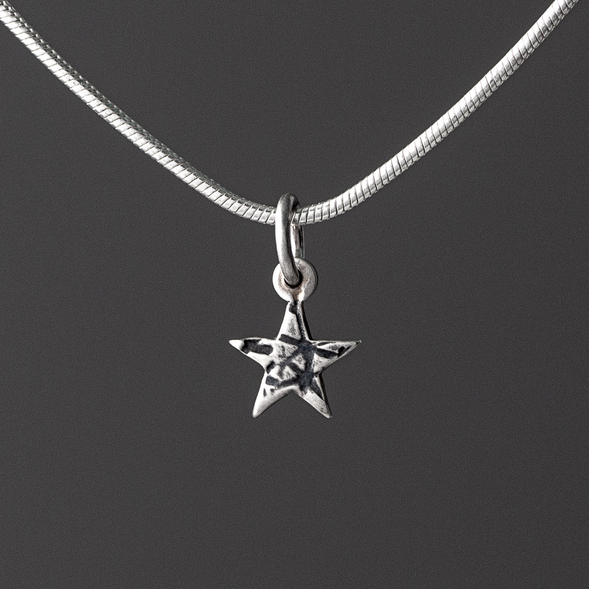 Stamped Star Oxidised Silver Pendant - Tiny by Silverfish