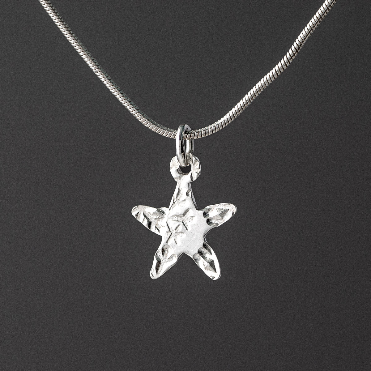 Stamped Star Silver Pendant by Silverfish