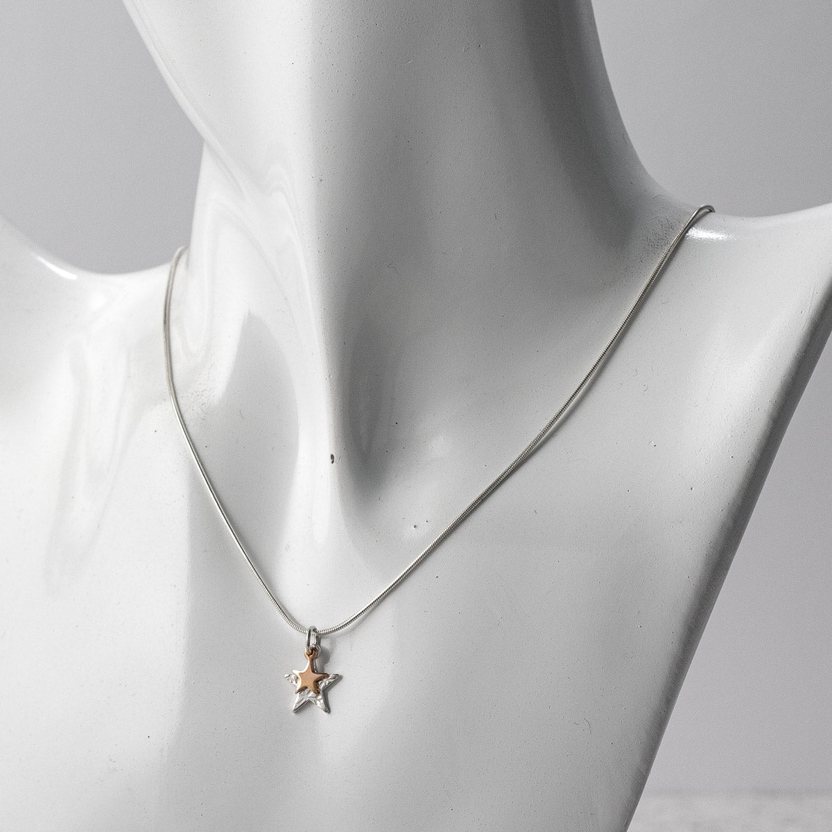 Stamped Star Duo Silver and Tiny 9ct Rose Gold Silver Pendant by Silverfish