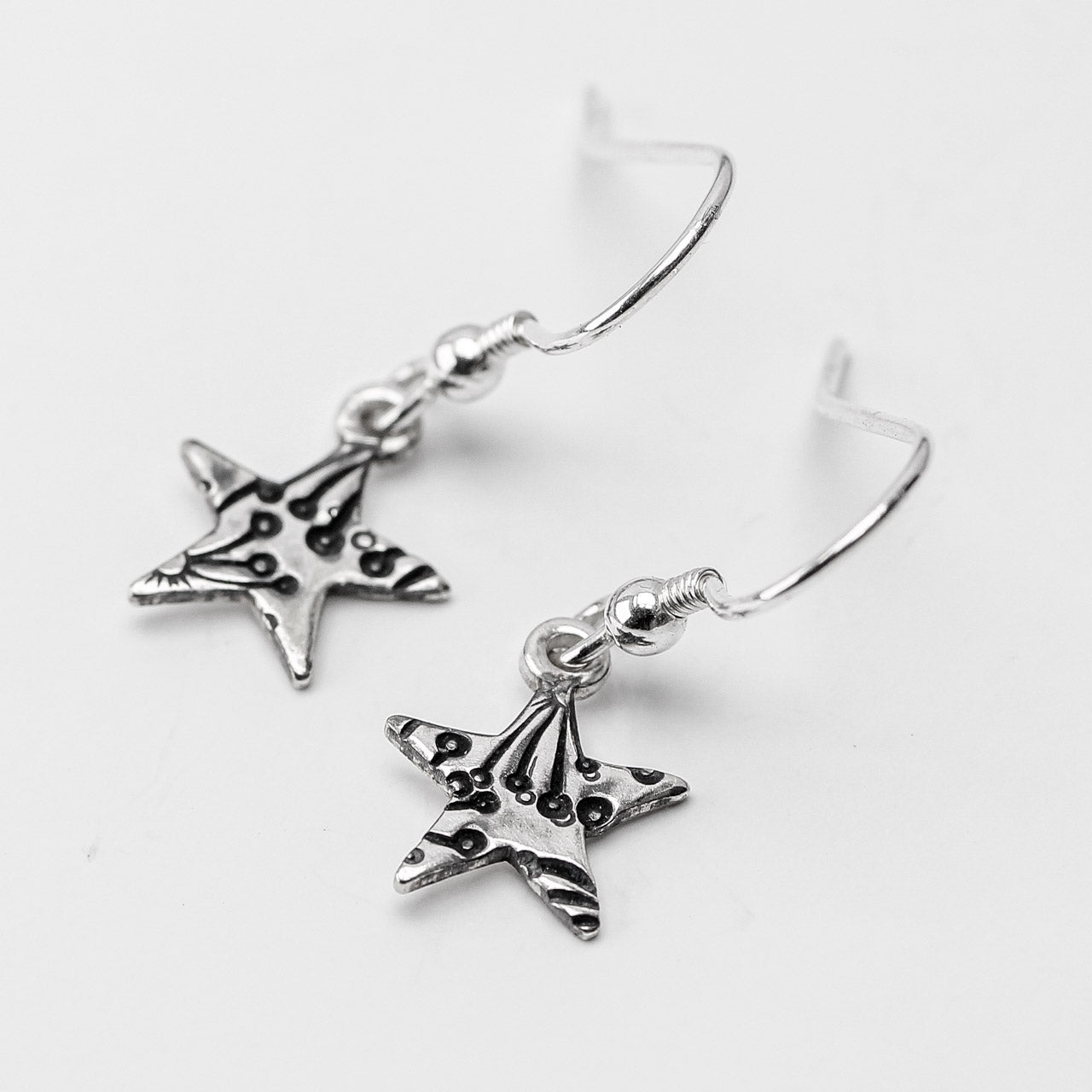 Stamped Star Oxidised Silver Drop Earrings by Silverfish